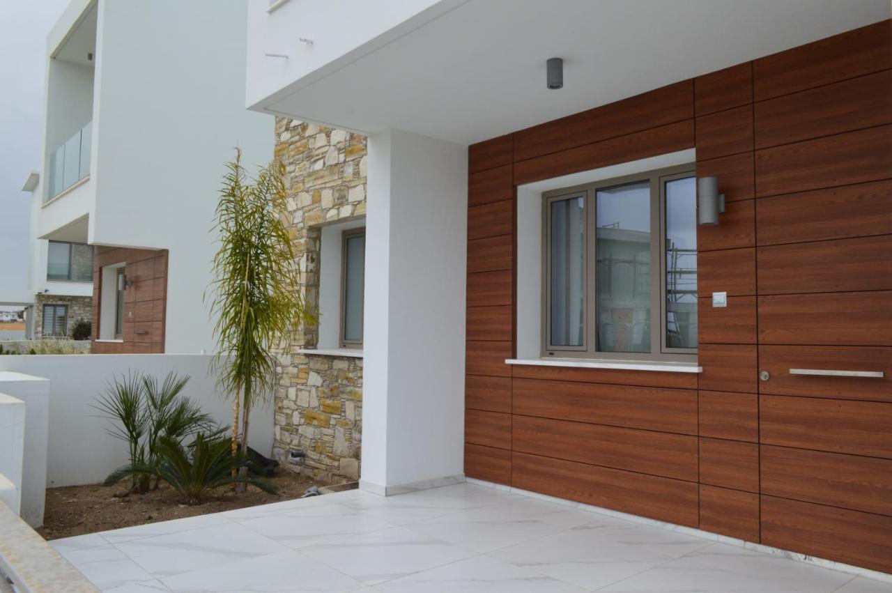 Palm Tree Villas Livadhia Екстериор снимка