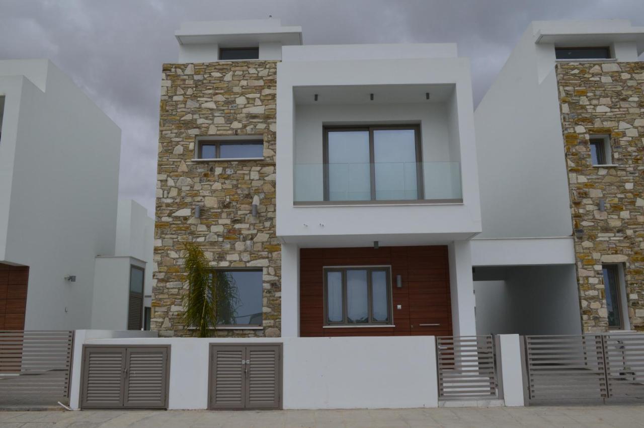 Palm Tree Villas Livadhia Екстериор снимка