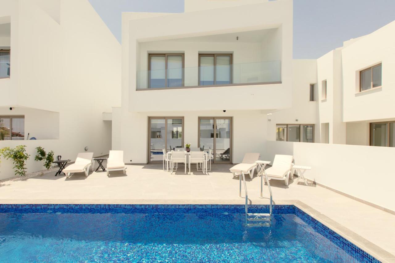 Palm Tree Villas Livadhia Екстериор снимка