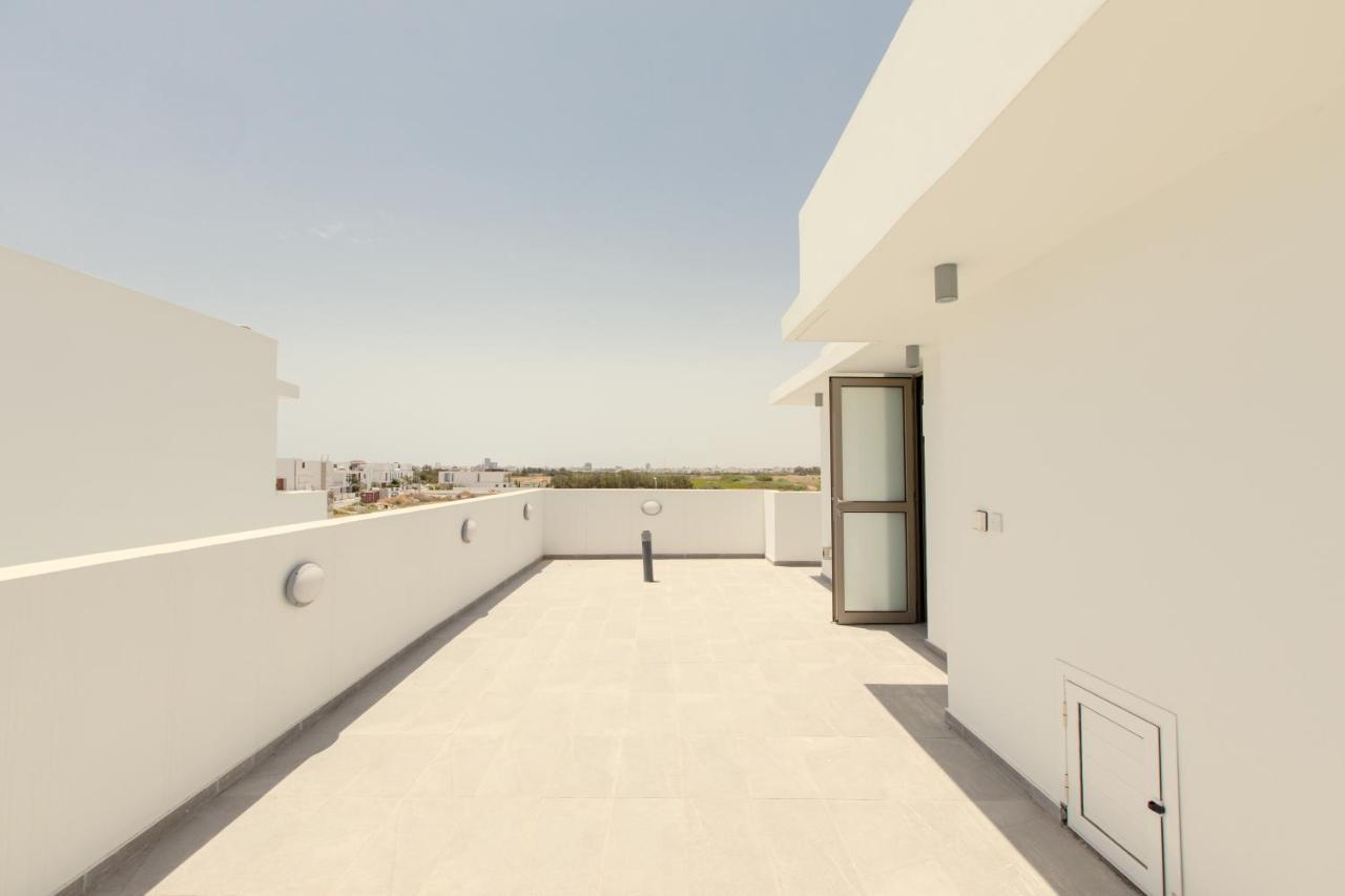 Palm Tree Villas Livadhia Екстериор снимка