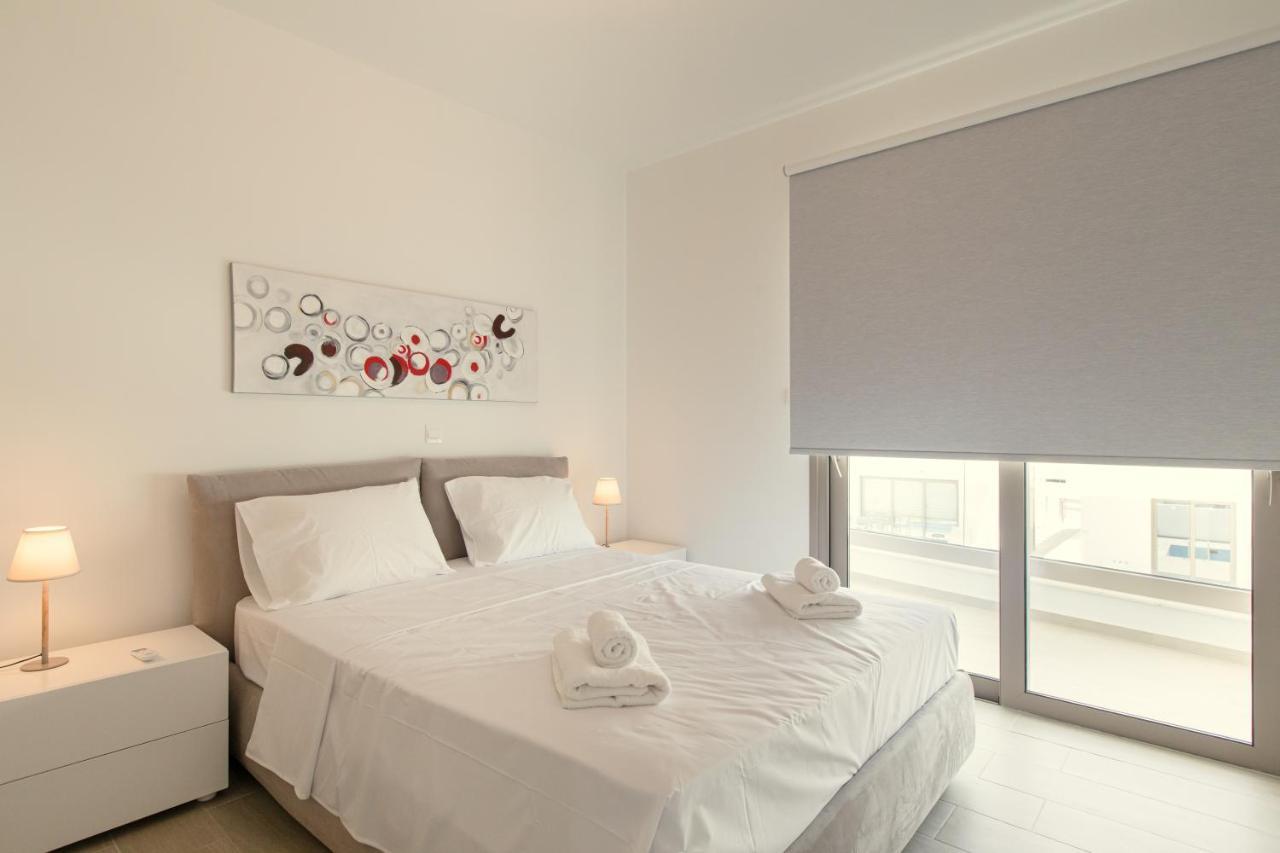 Palm Tree Villas Livadhia Екстериор снимка
